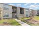 Attractive apartment complex with well-maintained landscaping and blue sky background at 11063 Running Ridge Rd, Charlotte, NC 28226