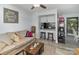 Inviting open-plan living area with a comfortable couch and convenient kitchen access at 11063 Running Ridge Rd, Charlotte, NC 28226