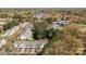 Aerial view of townhomes surrounded by lush trees at 11929 Kings Castle Ct, Charlotte, NC 28277
