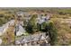 Aerial view of townhomes surrounded by lush trees at 11929 Kings Castle Ct, Charlotte, NC 28277