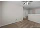 Carpeted loft area with neutral walls, a ceiling fan and easy access to multiple rooms at 11929 Kings Castle Ct, Charlotte, NC 28277