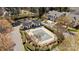 Aerial view of the neighborhood pool and surrounding landscape at 11929 Kings Castle Ct, Charlotte, NC 28277