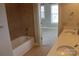Neutral bathroom with a bathtub and dual sinks at 121 Irving Ave # A, Mooresville, NC 28117