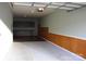 Spacious two car garage featuring built-in cabinets and updated lighting at 121 Irving Ave # A, Mooresville, NC 28117