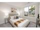 Comfortable bedroom with neutral carpet and a large picture window at 124 N Shayna Rd, Troutman, NC 28166