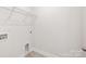 Unfinished storage room with tile flooring and simple wire shelves at 124 N Shayna Rd, Troutman, NC 28166