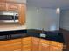 Eat-in kitchen featuring granite counters and modern fixtures at 139 Sain Rd, Statesville, NC 28625
