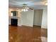 Cozy living room featuring hardwood floors and a fireplace at 139 Sain Rd, Statesville, NC 28625