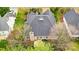 An aerial view of the home featuring a well-maintained roof and a backyard patio at 1509 Burning Lantern Ln, Kannapolis, NC 28081