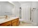 Classic bathroom with a shower, vanity, and bright neutral color palette at 1509 Burning Lantern Ln, Kannapolis, NC 28081