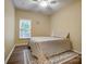 Bedroom with ceiling fan, natural light from window and hardwood floor at 1509 Burning Lantern Ln, Kannapolis, NC 28081