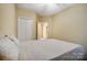 Bedroom with double door closet and an ensuite bathroom at 1509 Burning Lantern Ln, Kannapolis, NC 28081