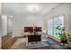This home office features a large window, two computer monitors, and stylish decor at 1509 Burning Lantern Ln, Kannapolis, NC 28081