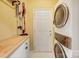 Laundry room with front load washer and dryer and wooden countertop at 1509 Burning Lantern Ln, Kannapolis, NC 28081