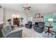Bright living room featuring a fireplace, hardwood floors, and ample seating space at 1509 Burning Lantern Ln, Kannapolis, NC 28081