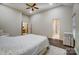Bright main bedroom features high ceiling, wood floor and an ensuite bathroom at 1509 Burning Lantern Ln, Kannapolis, NC 28081