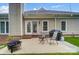 The backyard has a stone patio, a gas grill, a fire pit and outdoor seating at 1509 Burning Lantern Ln, Kannapolis, NC 28081
