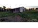 Exterior shot of a barn featuring open stalls and sturdy construction at 1524 J Rhyne Reep Rd, Vale, NC 28168