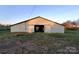 Large metal barn with sliding door and open interior space at 1524 J Rhyne Reep Rd, Vale, NC 28168