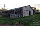 Large barn with an open shelter, offers ample space and versatile functionality at 1524 J Rhyne Reep Rd, Vale, NC 28168