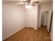Bedroom with hardwood floors featuring a closet and natural light at 1524 J Rhyne Reep Rd, Vale, NC 28168