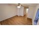 Bedroom featuring hardwood floors, two closets, and natural light from window at 1524 J Rhyne Reep Rd, Vale, NC 28168