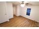 Comfortable bedroom with hardwood floors, featuring closet and one window at 1524 J Rhyne Reep Rd, Vale, NC 28168