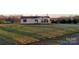 Charming single-story home with a well-manicured lawn and landscaping at 1524 J Rhyne Reep Rd, Vale, NC 28168