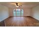 Bright living room featuring large windows and hardwood floors, perfect for gatherings at 1524 J Rhyne Reep Rd, Vale, NC 28168
