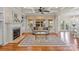 Bright and airy living room featuring a fireplace and coffered ceilings at 16123 Chiltern Ln, Huntersville, NC 28078