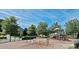 Community playground featuring swings, slides, and climbing structures, offering a fun and safe environment at 16123 Chiltern Ln, Huntersville, NC 28078