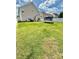 Expansive backyard with a trampoline and a privacy fence at 16306 Hayfield Rd, Charlotte, NC 28213