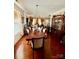 A beautifully appointed dining room featuring a long table and elegant chandelier at 16306 Hayfield Rd, Charlotte, NC 28213