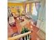 Cozy sun-drenched living room featuring a charming seating area at 16306 Hayfield Rd, Charlotte, NC 28213