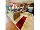 Comfortable living room with a fireplace and views of the backyard at 16306 Hayfield Rd, Charlotte, NC 28213