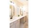 Bright bathroom with double sinks, modern black fixtures, and a window offering natural light, a stylish and functional space at 165 Singleton Rd, Mooresville, NC 28117