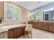Luxurious bathroom featuring granite counters, a soaking tub, and a separate shower at 18420 Rosapenny Rd, Charlotte, NC 28278
