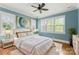 Bright bedroom with large windows, neutral decor, and modern finishes at 18420 Rosapenny Rd, Charlotte, NC 28278