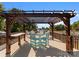 Inviting deck with pergola, perfect for enjoying outdoor dining with a scenic waterfront view at 18420 Rosapenny Rd, Charlotte, NC 28278