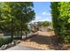 Paver path leading to boat dock and scenic views at 18420 Rosapenny Rd, Charlotte, NC 28278