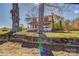 Charming two-story home with a welcoming porch, nestled among mature trees at 2114 Whitworth Rd, Cherryville, NC 28021