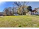 Expansive property with a two-story home, outbuildings, and a well-maintained lawn at 2114 Whitworth Rd, Cherryville, NC 28021