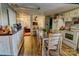 Open-concept eat-in kitchen seamlessly connected to the living area, creating a social space at 2114 Whitworth Rd, Cherryville, NC 28021