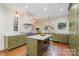 Modern kitchen with marble countertops, custom cabinets, and stainless steel appliances at 2120 Malvern Rd, Charlotte, NC 28207