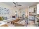 Comfortable living room and kitchen combination featuring stylish decor and plenty of seating at 2120 Malvern Rd, Charlotte, NC 28207