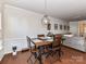 Cozy dining room with hardwood floors and decorative pendant lighting at 2240 Kensington Station Pkwy, Charlotte, NC 28210