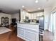 Modern kitchen with white cabinets, granite countertops, and stainless steel appliances at 2240 Kensington Station Pkwy, Charlotte, NC 28210