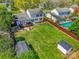 Expansive backyard features a deck, fountain, pool, and storage shed, perfect for outdoor living at 2243 Flint Glenn Ln, Charlotte, NC 28262