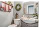 Stylish bathroom featuring a vanity with elegant fixtures, a mirror, and decor at 2243 Flint Glenn Ln, Charlotte, NC 28262