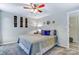 Comfortable bedroom with soft lighting, neutral walls, and plush carpeting at 2243 Flint Glenn Ln, Charlotte, NC 28262
